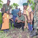 Cabinet Secretary for Roads and Transport takes part in Tree Planting at Gembe Hills, Homa Bay County on National Tree Growing Day